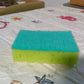 2-in-1 Multi-Purpose Scrub Sponge – Wear Resistant Dish & Furniture Cleaner (1 Pc)