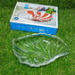 Leaf-shaped glass tray with snacks