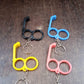 2-in-1 Plastic Dual-Finger Mobile Stand cum Keyring  (1 Pc, Mixed Color)